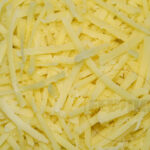 Käse mit FEUMA MReibzylinder FEUMA Multifunktionsküchenmaschine zerkleinert